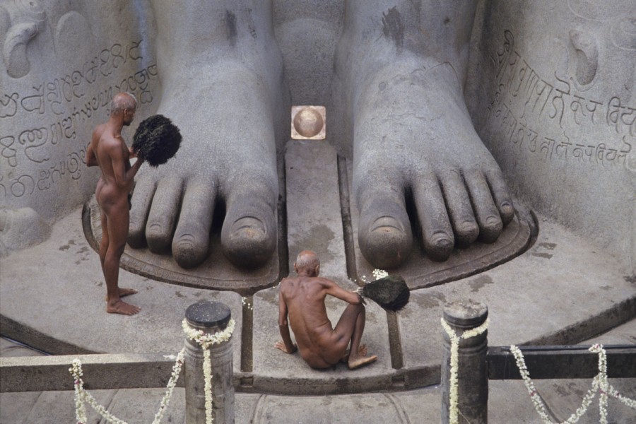 Jain Digambara monks at the feet of Bahubali statue, Shravanabelagola, Karnataka, India
