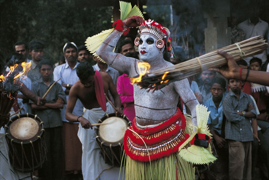 Dance of Teyyam Gulikan, Pallipram kavu, Kerala, India